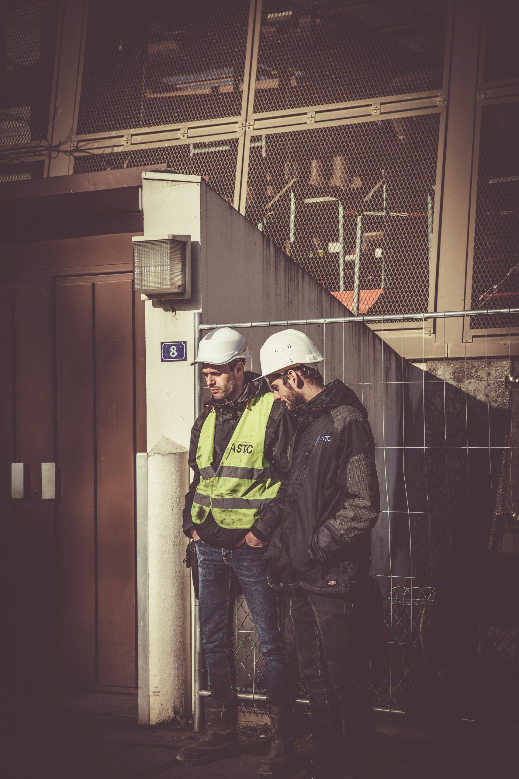 two-men-wearing-white-hard-hat-901941