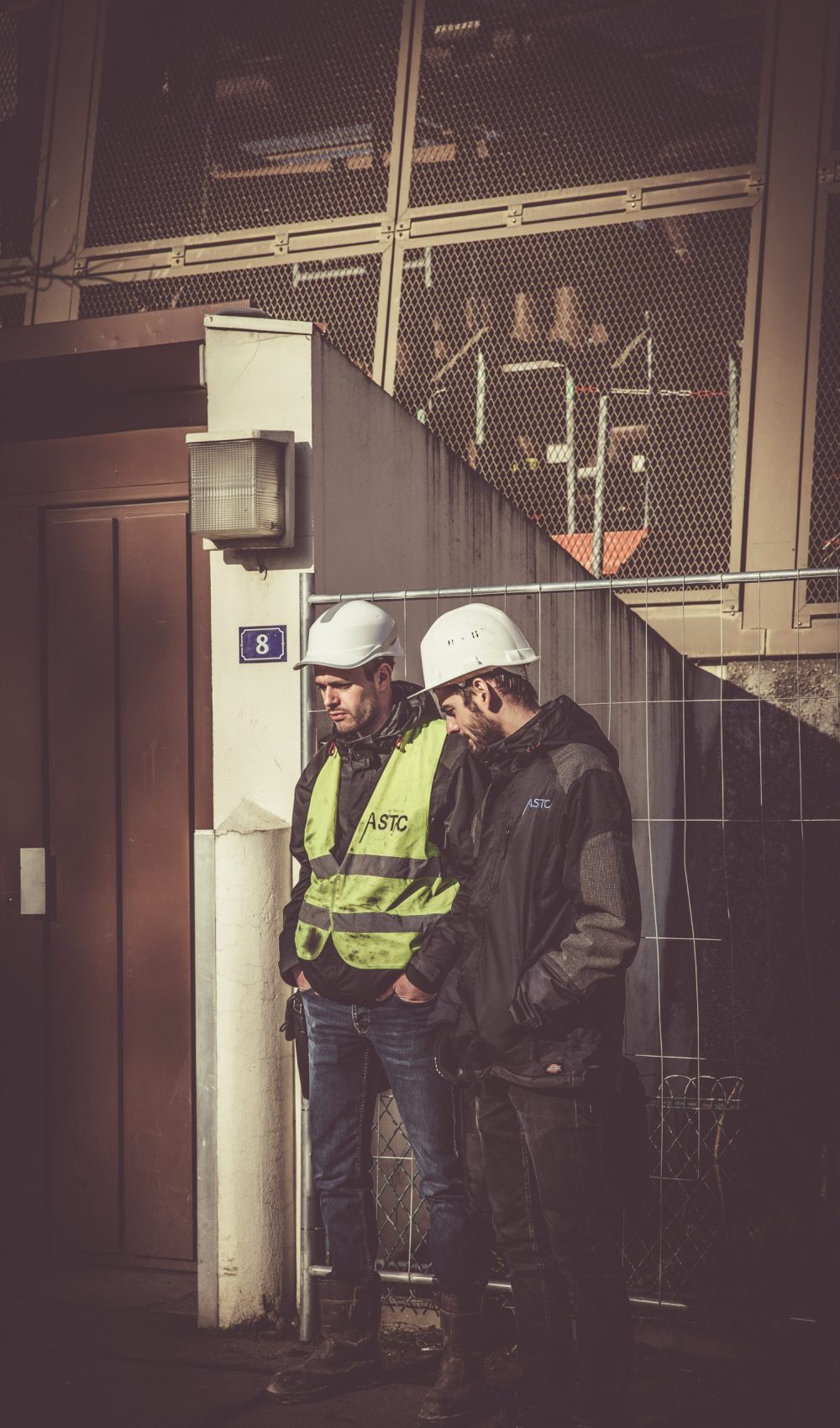 two-men-wearing-white-hard-hat-901941 two-men-wearing-white-hard-hat-901941